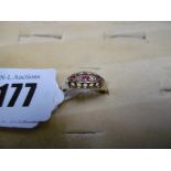 AN ANTIQUE 18CT GOLD RUBY AND DIAMOND RING SIZE M AND HALF