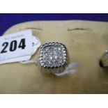 A GENTS 18CT SIXTEEN DIAMOND SET RING,