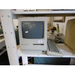 AN APPLE MAC PLUS INCLUDING KEYBOARD