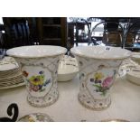 A PAIR OF CONTINENTAL PORCELAIN FLORAL AND GILT VASES