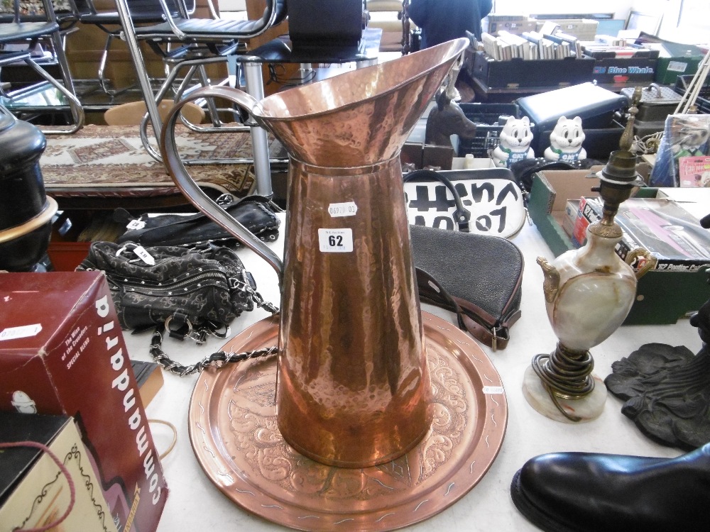 A COPPER JUG AND A DECORATIVE COPPER PLATE - Image 2 of 2