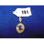 A 14CT YELLOW GOLD DIAMOND AND TANZANITE PENDENT