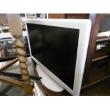 A WHITE SAMSUNG TV