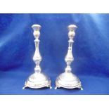 A PAIR OF STERLING SILVER HOLLOW SABBATH CANDLESTICKS