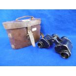 A SET OF OLD BINOCULARS