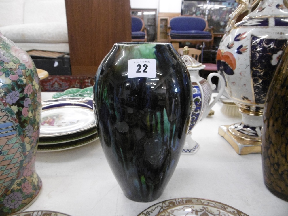 A LACQUERED MULTI COLOUR VASE