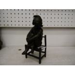 BRONZE GIRL ON A CHAIR