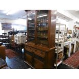 A 19TH CENTURY BOOKCASE ON CUPBOARD BASE