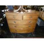 AN INLAID 19TH CENTURY BOW FRONT CHEST OF DRAWERS