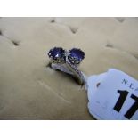 14ct GOLD, TWO SAPPHIRE CROSSOVER RING WITH DIAMOND SHOULDERS,
