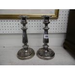 A PAIR OF 19TH CENTURY SILVER PLATED CANDLESTICKS