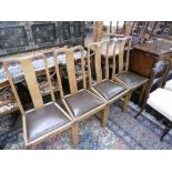 A SET OF FOUR QUEEN ANN STYLE CHAIRS