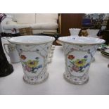A PAIR OF CONTINENTAL PORCELAIN FLORAL AND GILT VASES