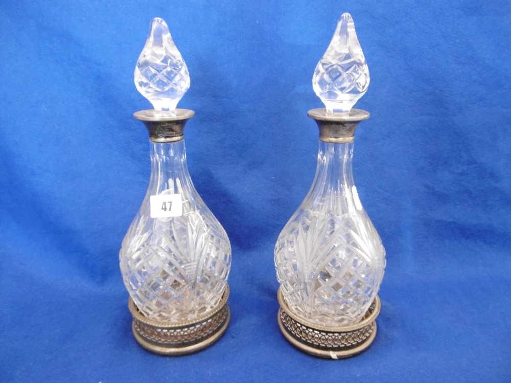 A PAIR OF CUT GLASS DECANTERS WITH SILVER COLLARS - Image 2 of 2