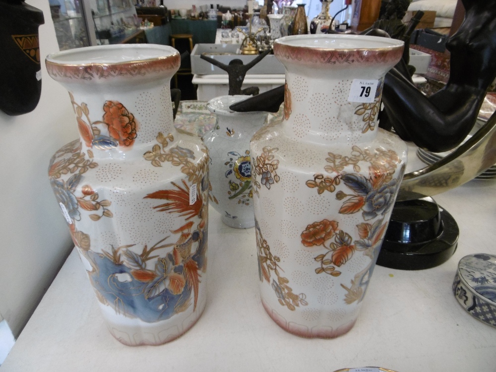 PAIR OF ORANGE PORCELAIN VASES