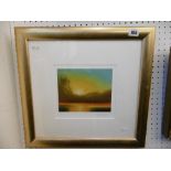 A GILT FRAMED PICTURE SUNSET