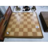 A CHESS SET AND BOARD