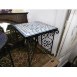 A SQUARE IRON MOSAIC TABLE