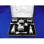 A HM SILVER BOXED CRUET SET