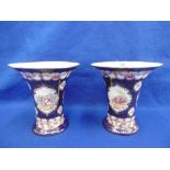 A PAIR OF SEVRES STYLE GILT DECORATED PORCELAIN VASES