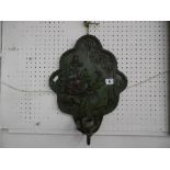 A BRONZE WALL PLAQUE CANDLE HOLDER