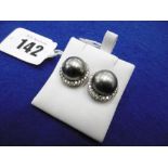 A PAIR OF WHITE GOLD LARGE TAHITIAN PEARL AND DIAMOND HALLO STUD EARRINGS