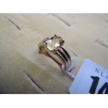 A 14CT GOLD AND TOPAZ RING