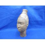 A 20TH CENTURY AFRICAN BRASS HEAD SCULPTURE OF A WOMAN POSSIBLE NIGERIAN