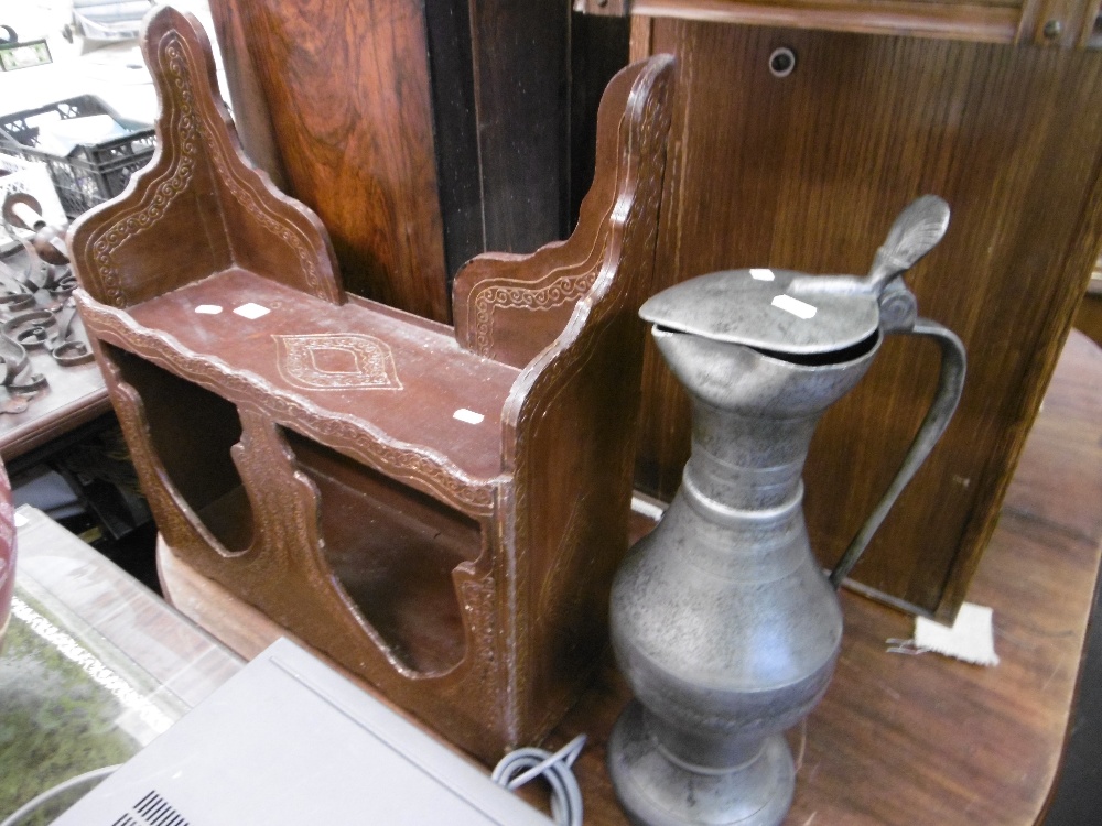 A MOORISH WALL SHELF AND PEWTER JUG