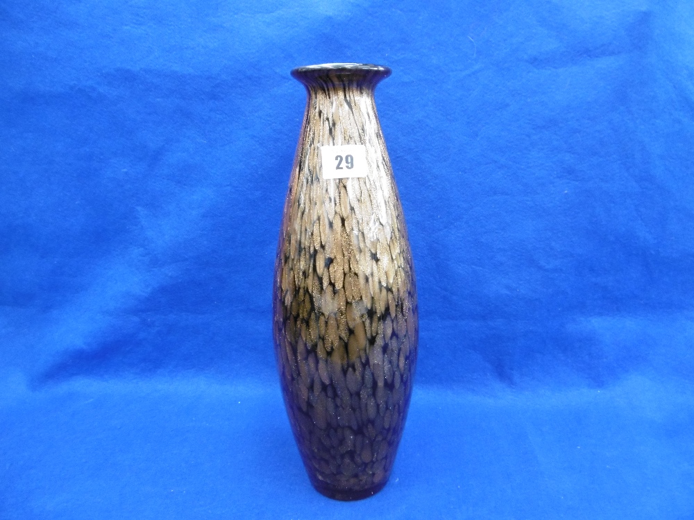 A BLACK AND GOLD MURANO GLASS VASE