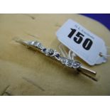 A 9CT ART DECO STYLE DIAMOND AND SAPPHIRE BAR BROOCH