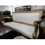 A GILT THREE SEATER SALON SOFA