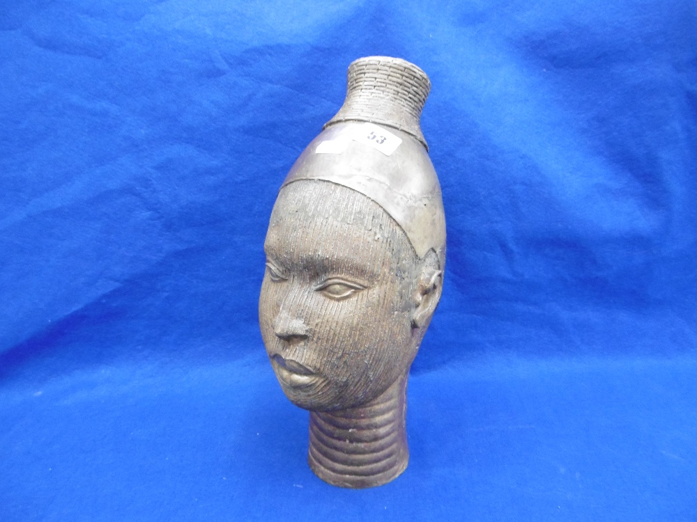 A 20TH CENTURY AFRICAN BRASS HEAD SCULPTURE OF A WOMAN POSSIBLE NIGERIAN