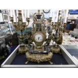 A SPELTER GILT FIGURAL GARNITURE CLOCK SET