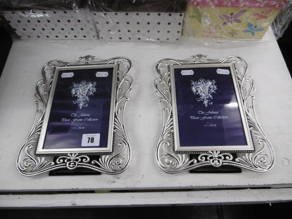 TWO SILVERED PICTURE FRAMES