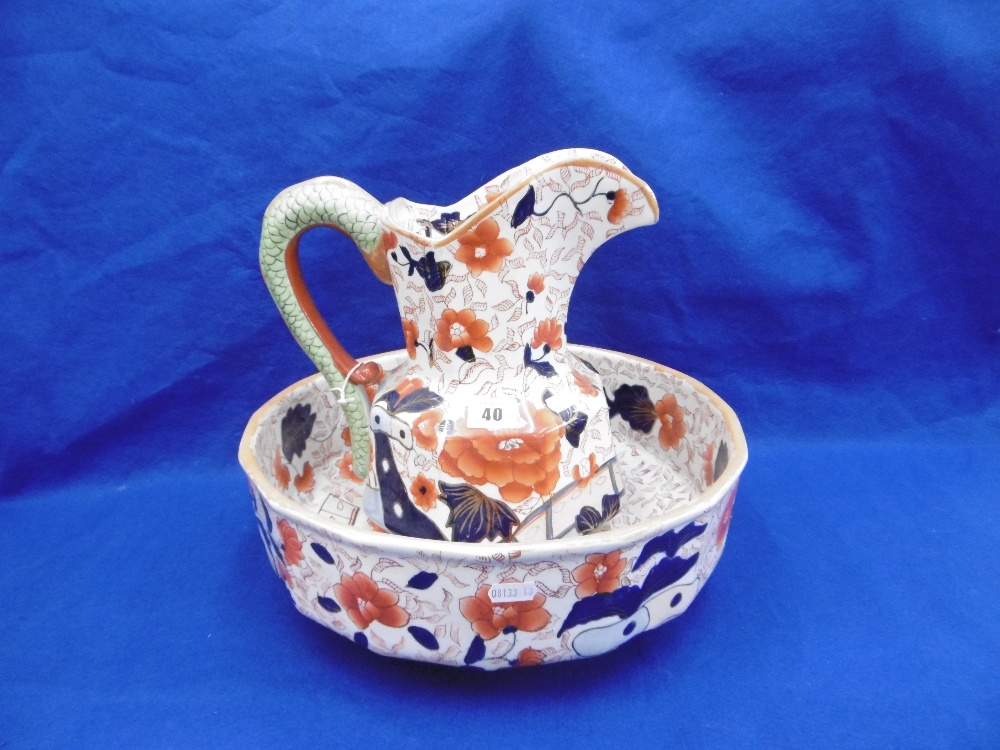 A DECORATIVE JUG AND BOWL SET