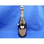 A 1976 BOTTLE OF MOET AND CHANDON DOM PERIGNON CHAMPAGNE
