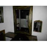 A DECORATIVE CONSOLE TABLE AND MIRROR