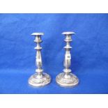 A PAIR OF 19TH CENTURY SILVER PLATED CANDLESTICKS