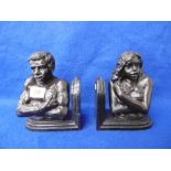 A PAIR OF BRONZE AND MARBLE BOOKENDS