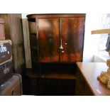 A MAHOGANY WALL UNIT