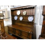 AN OAK DRESSER (CIRCA 1920) STAMPED MAPLES ON BACK, 152X190CM APPROX.