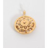 BROCHE PENDENTIF OR ROSE EN ROSACE En or rose 18 K en forme derosace. Pb : 3,2 g -