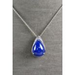 Pendentif or blanc serti d'une tanzanite poire cabochon pesant 19,02 c bélière [...]