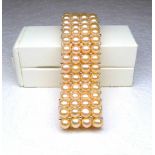 Bracelet 4 rangs en perles de culture naturelles couleur saumon 6 mm montées sur [...]