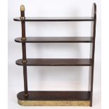 ETAGERE DE EUGENE PRINTZ (1889-1948) En bois teinté et doré, composée de quatre [...]