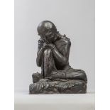 Lohan couvert d'une étoffe assis sur un rocher , sa tête reposant sur ses mains [...]