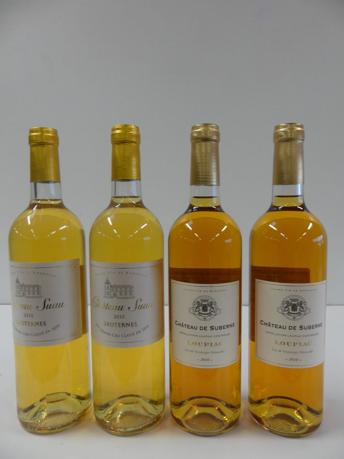 4 BTLES : 2 Sauternes Château Suau 2ème Grand Cru Classé 2010 ; 2 Château de [...]