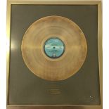 DIRE STRAITS GOLD DISC - Danish industry award gold disc presented to Dire Straits' drummer Pick