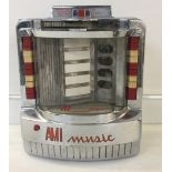 AMI MUSIC 200 SELECTION JUKEBOX - A vintage AMI Music coin operated jukebox.